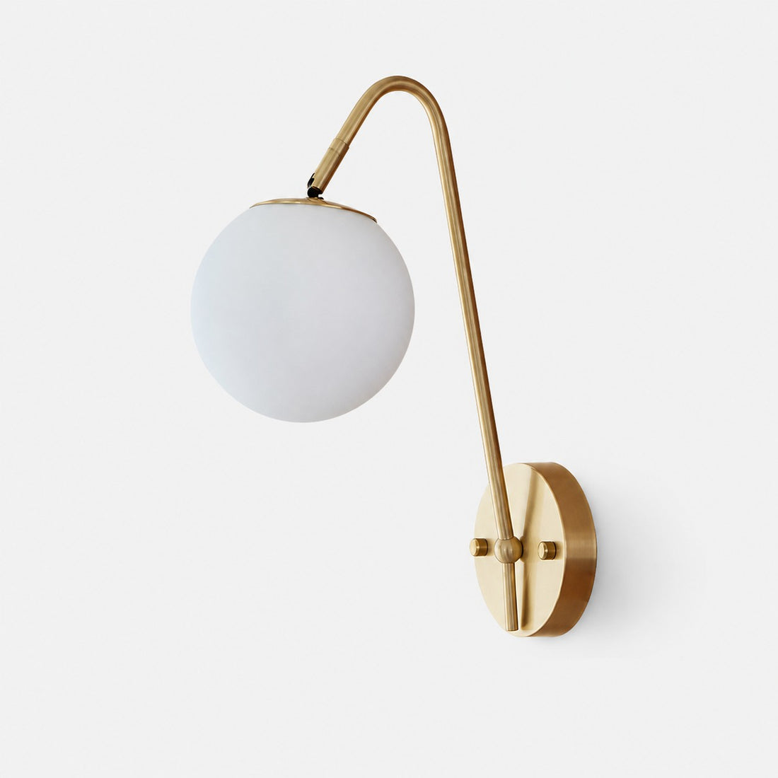 French brass wall light with milky white glass globe shade