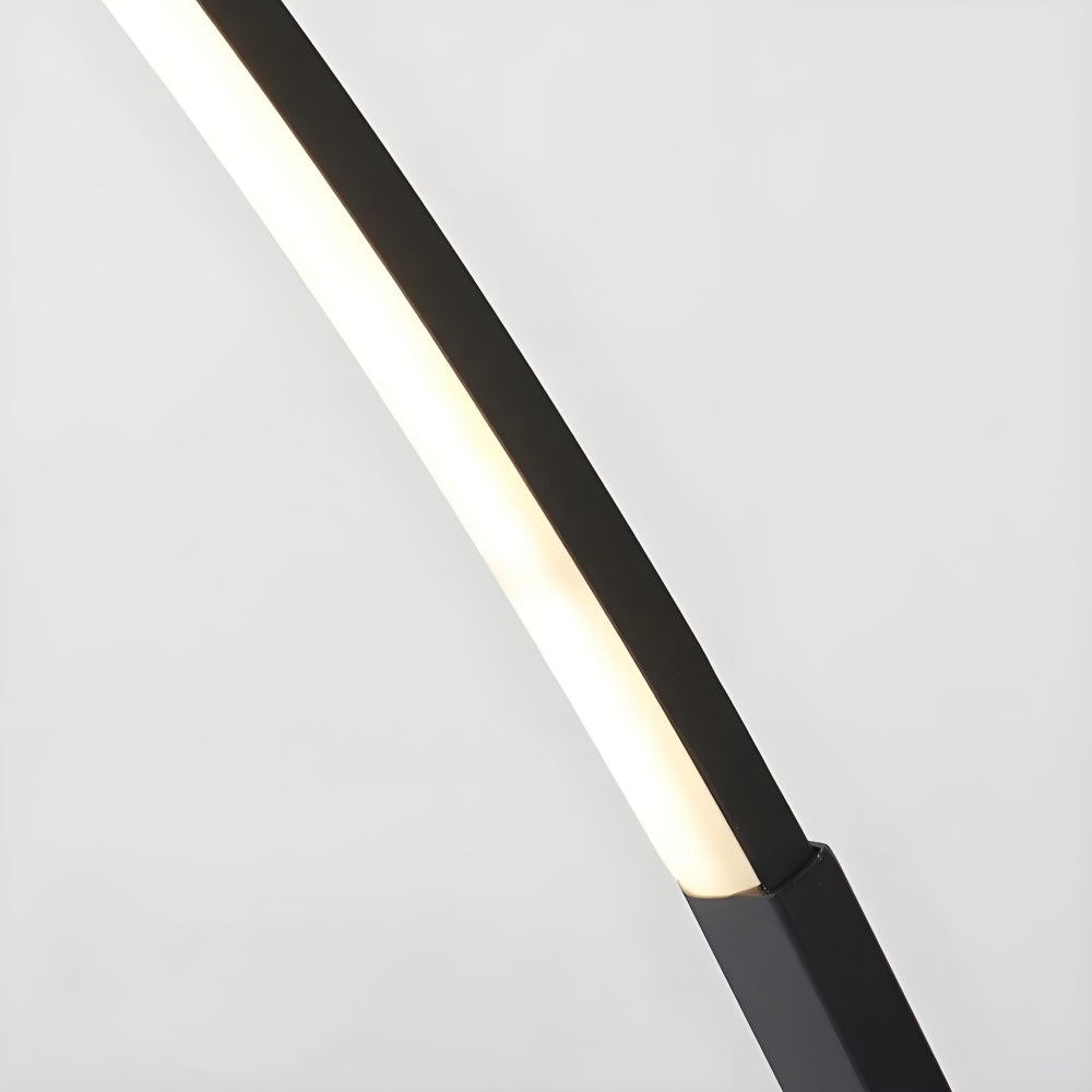 Lirra Minimal Curved Floor Lamp – Elegant Metal Accent for Living Spaces