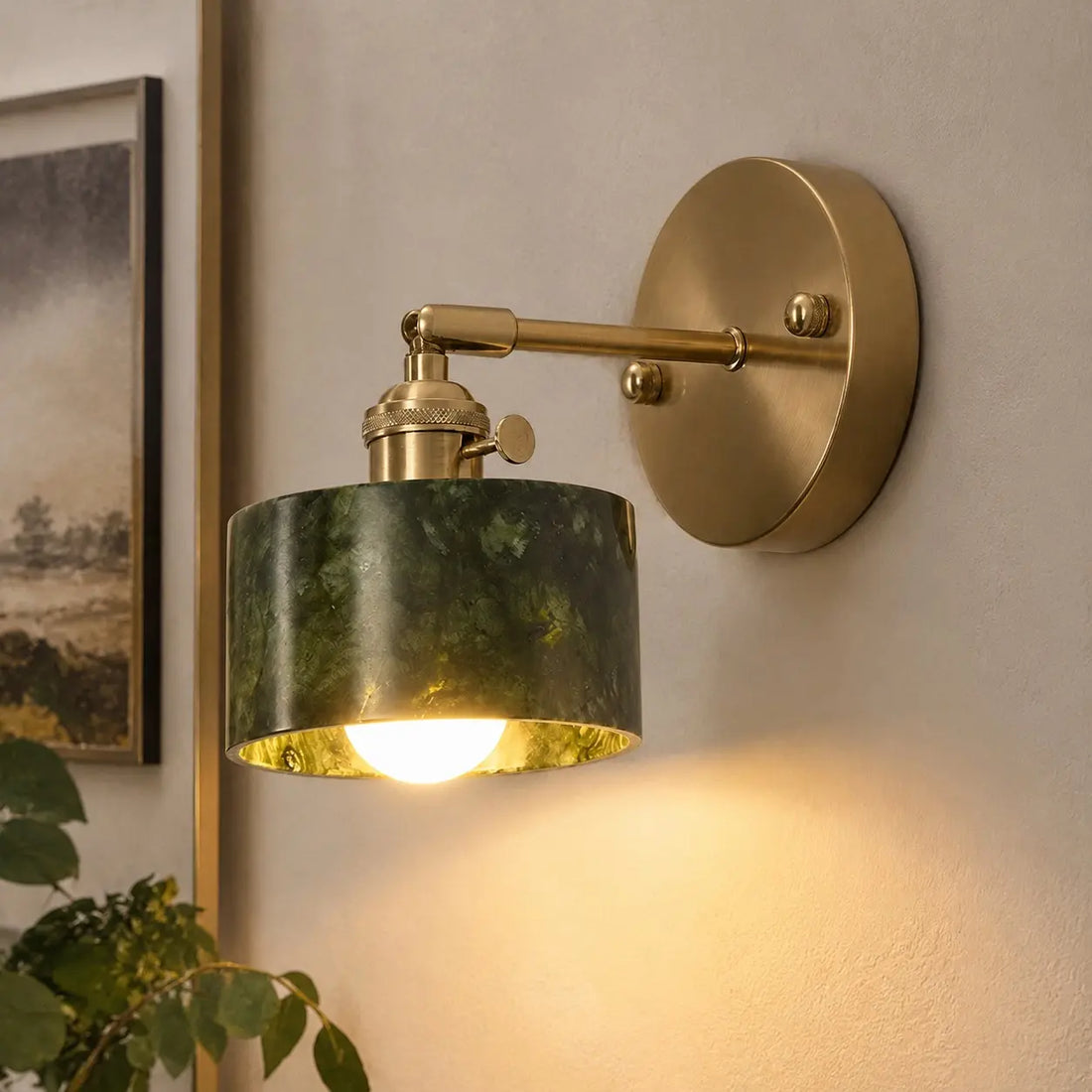 Cylindrical green stone wall light in use