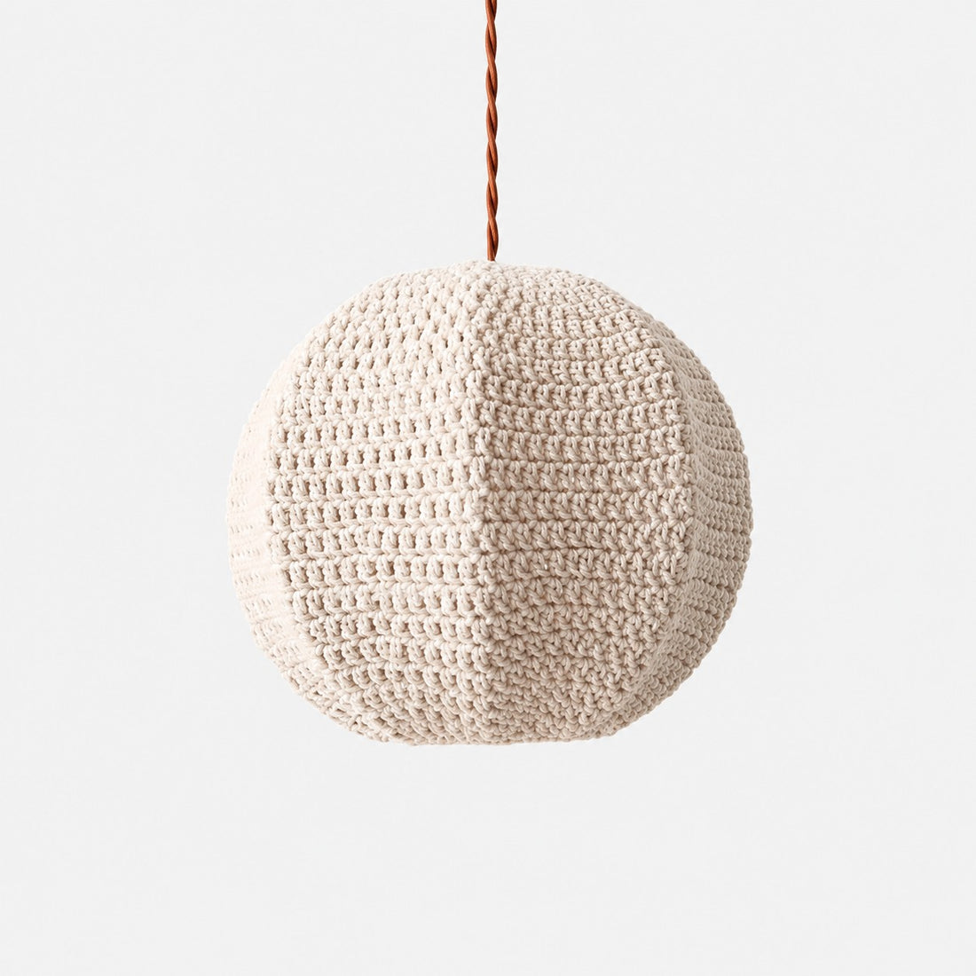 Ivory 40 cm handwoven globe pendant light shown from an angled front view