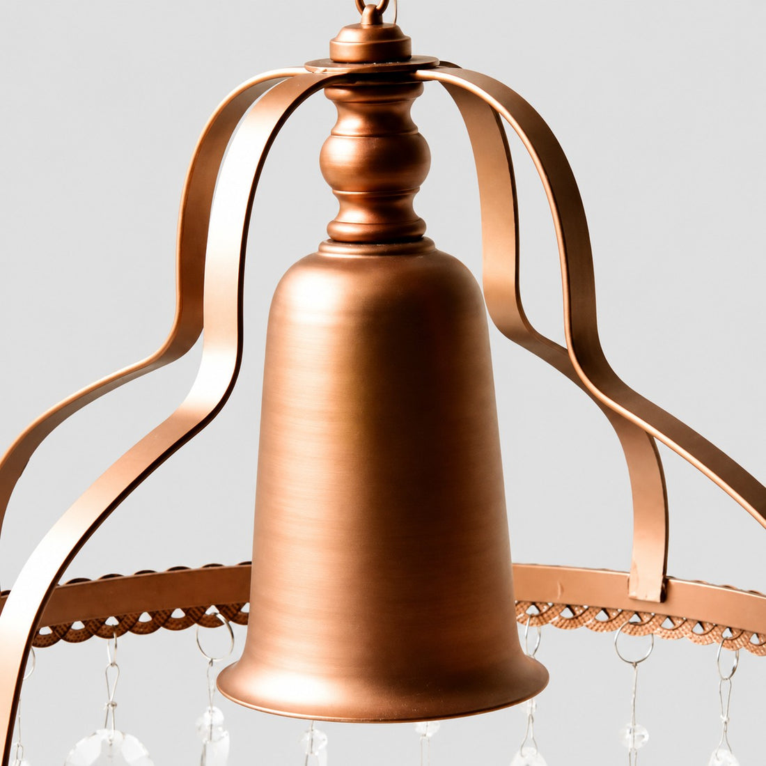 Close view of the copper-toned metal crown