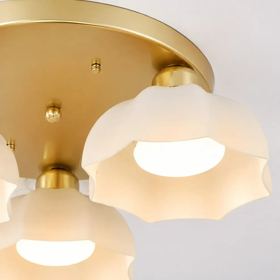 White glass shade and gold finish detail