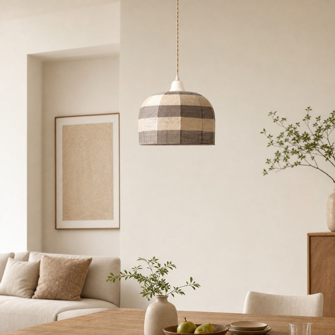 White cup cotton thread pendant light in a bright dining room