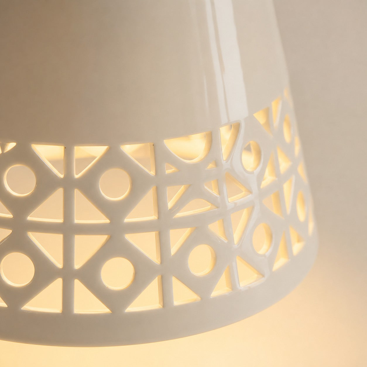 close view of cutout ceramic shade edge and warm glow