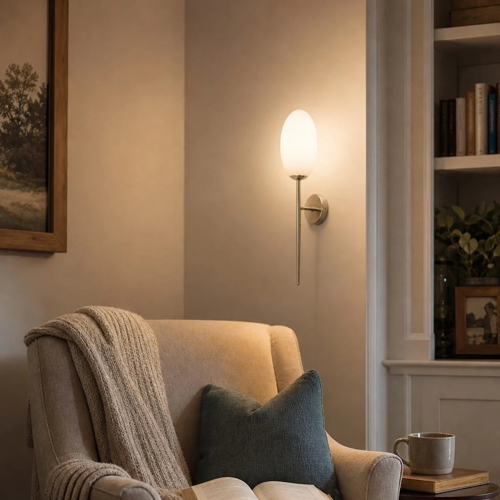 Milk glass wall sconce in a reading corner