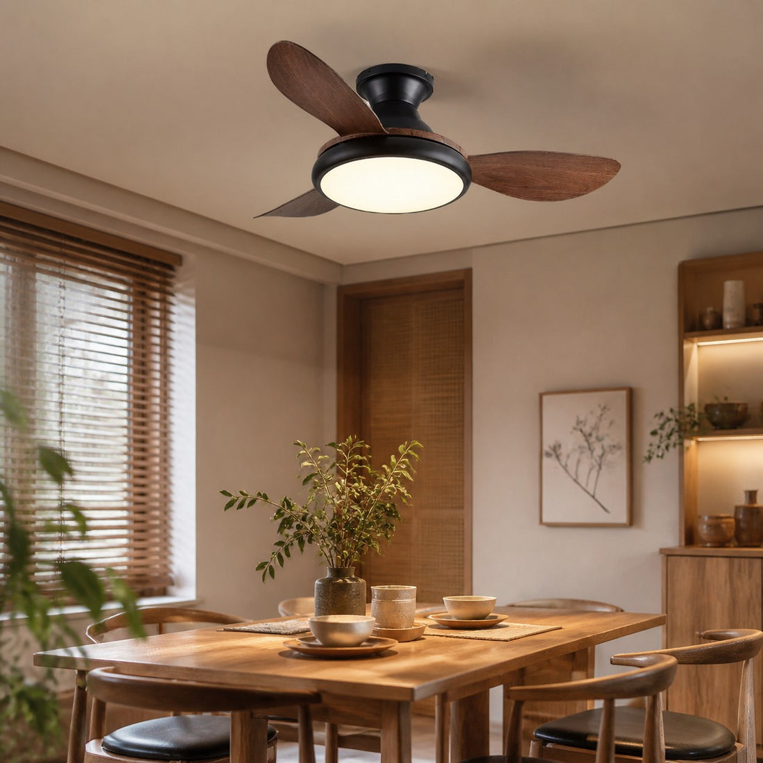 Low-profile ceiling fan above a dining table