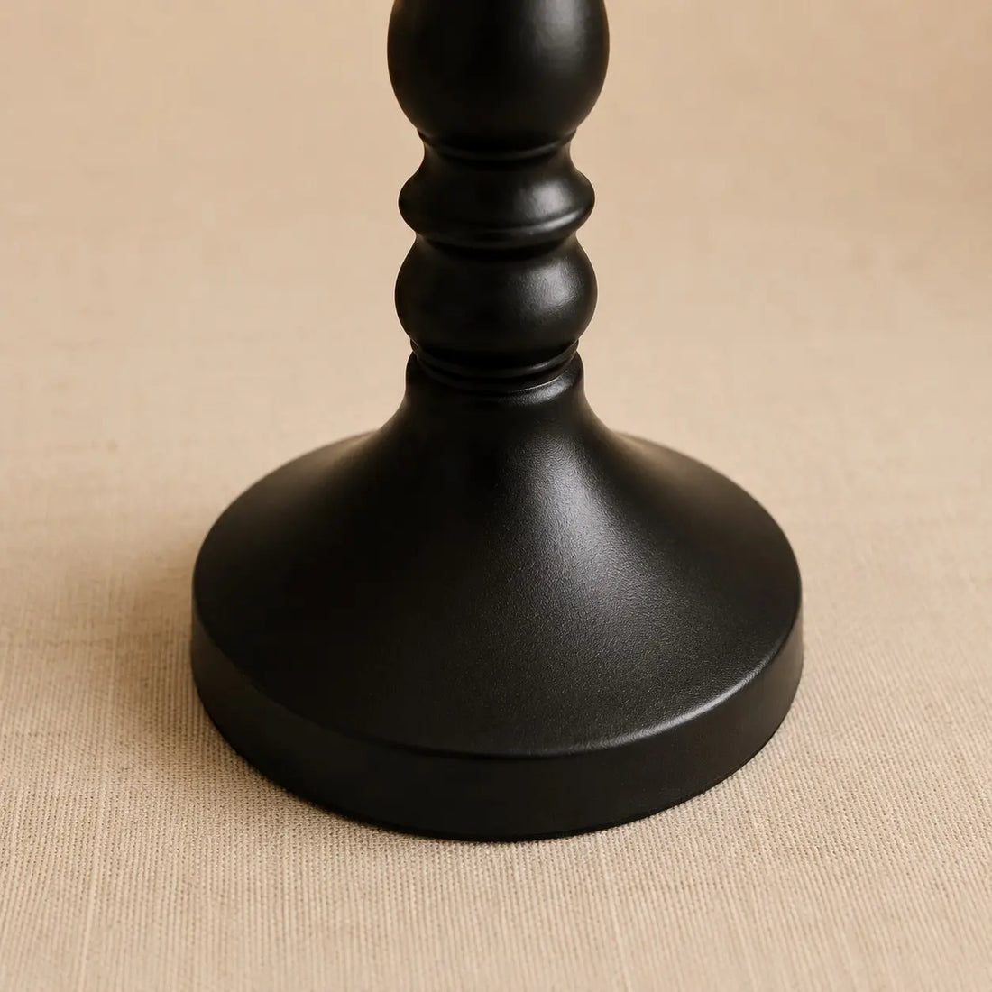 Close-up of the black iron table lamp base finish