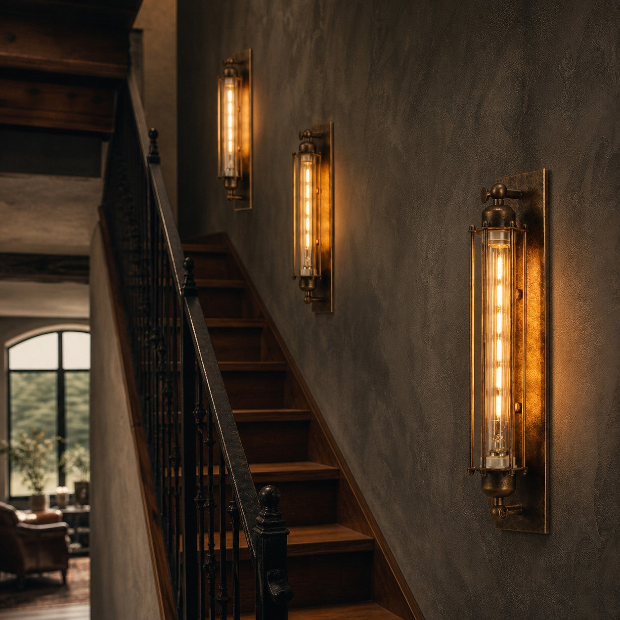 Industrial tube wall sconces along a stair wall