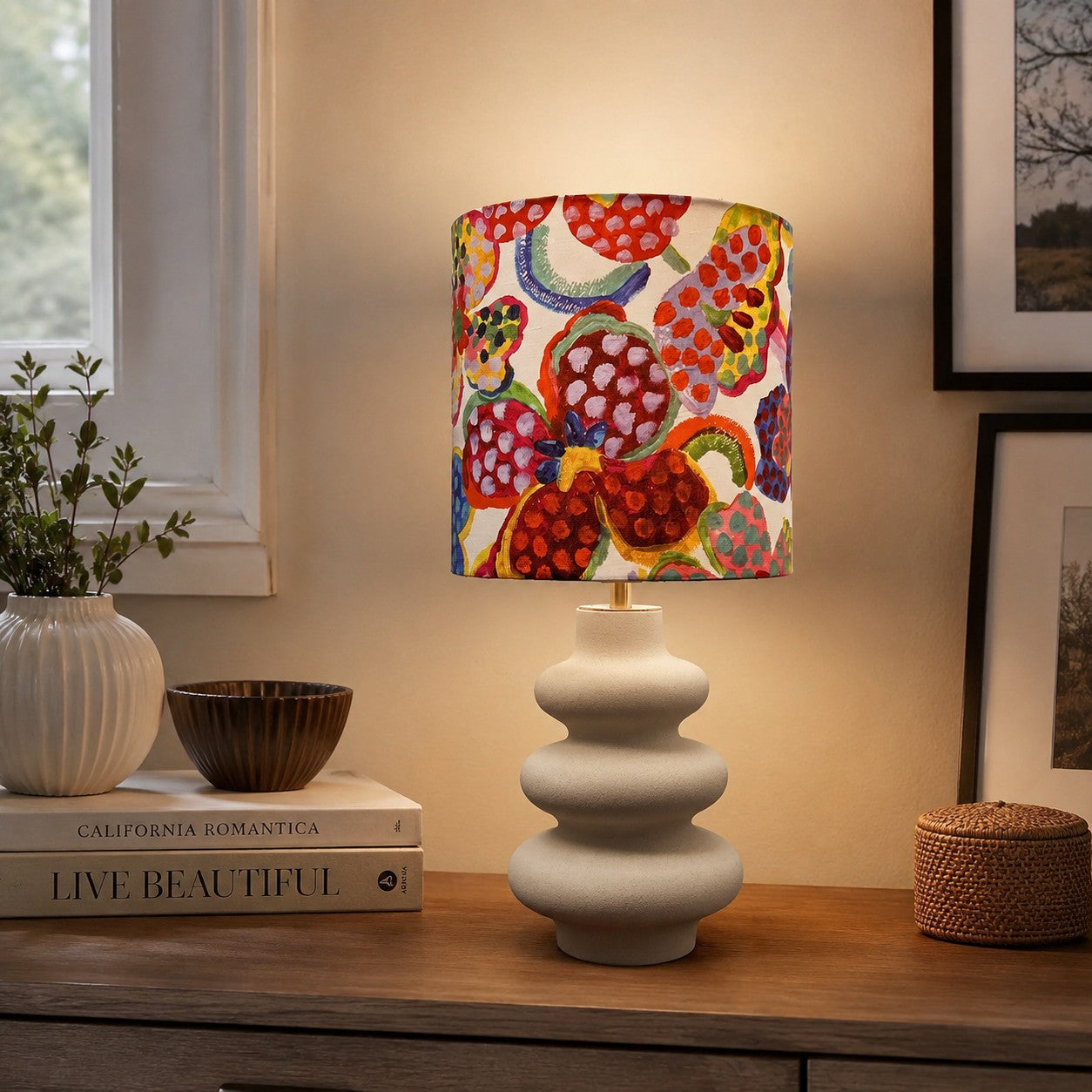 Floral fabric shade ceramic table lamp on a side table