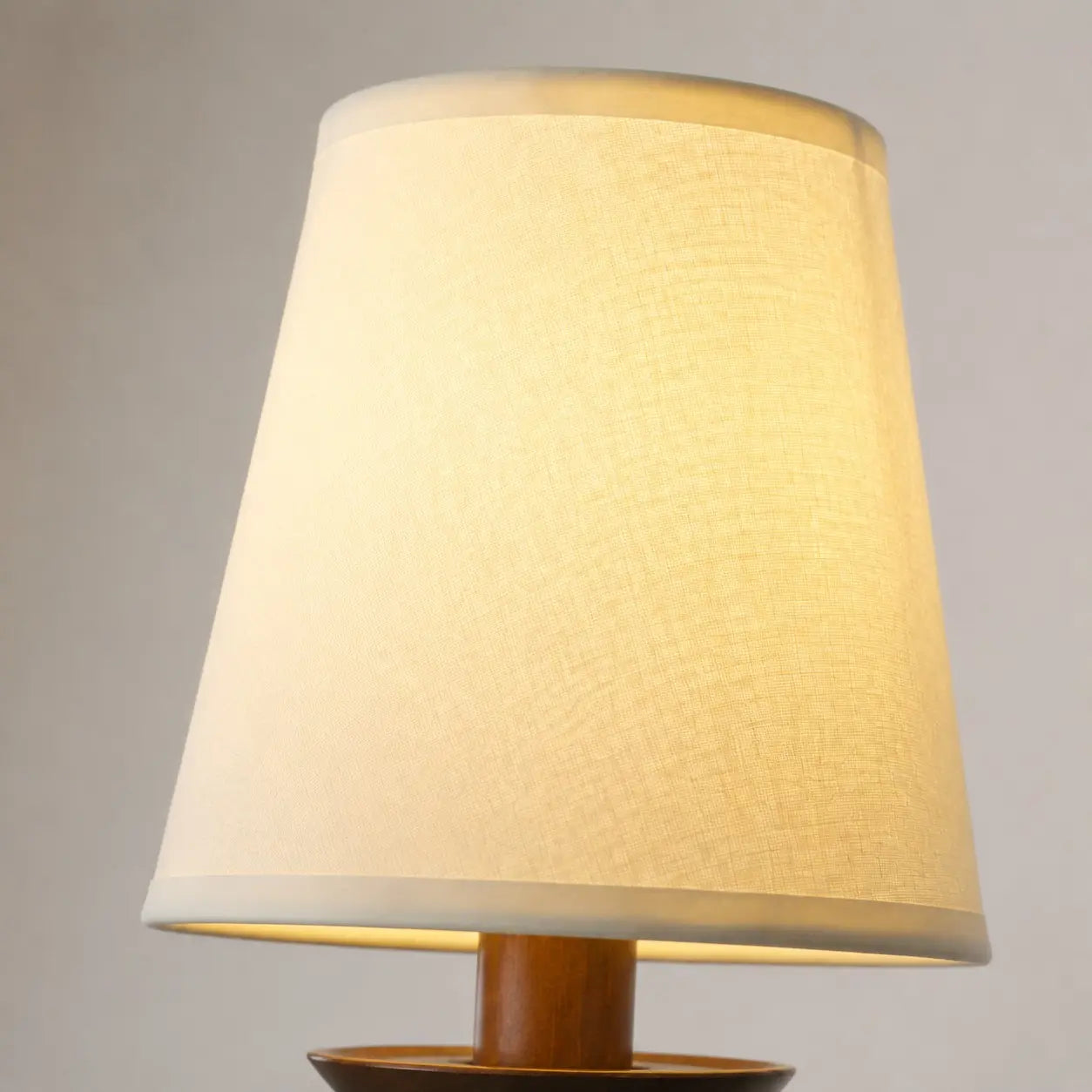 Close view of the fabric shade texture and trim