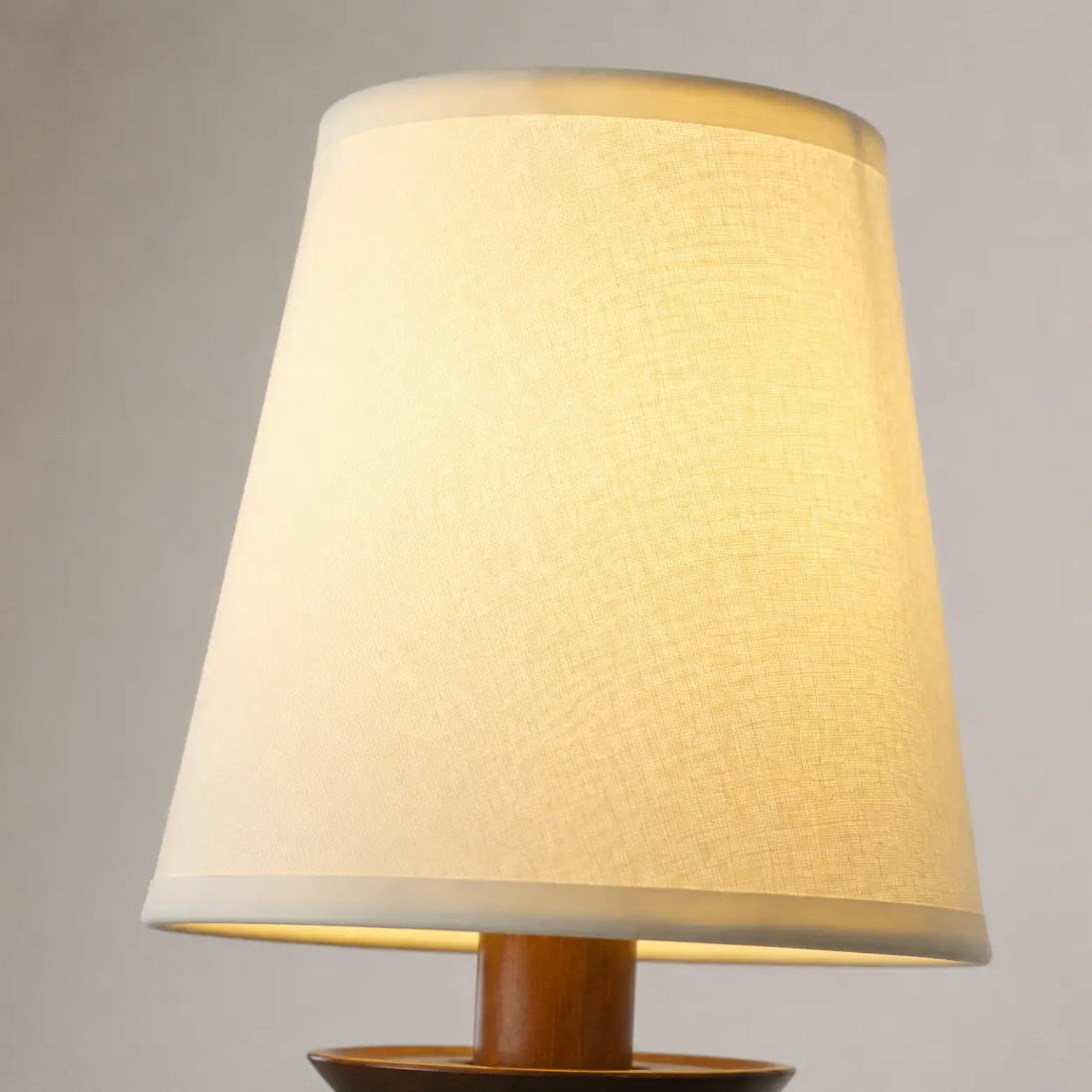 Close view of the fabric shade texture and trim