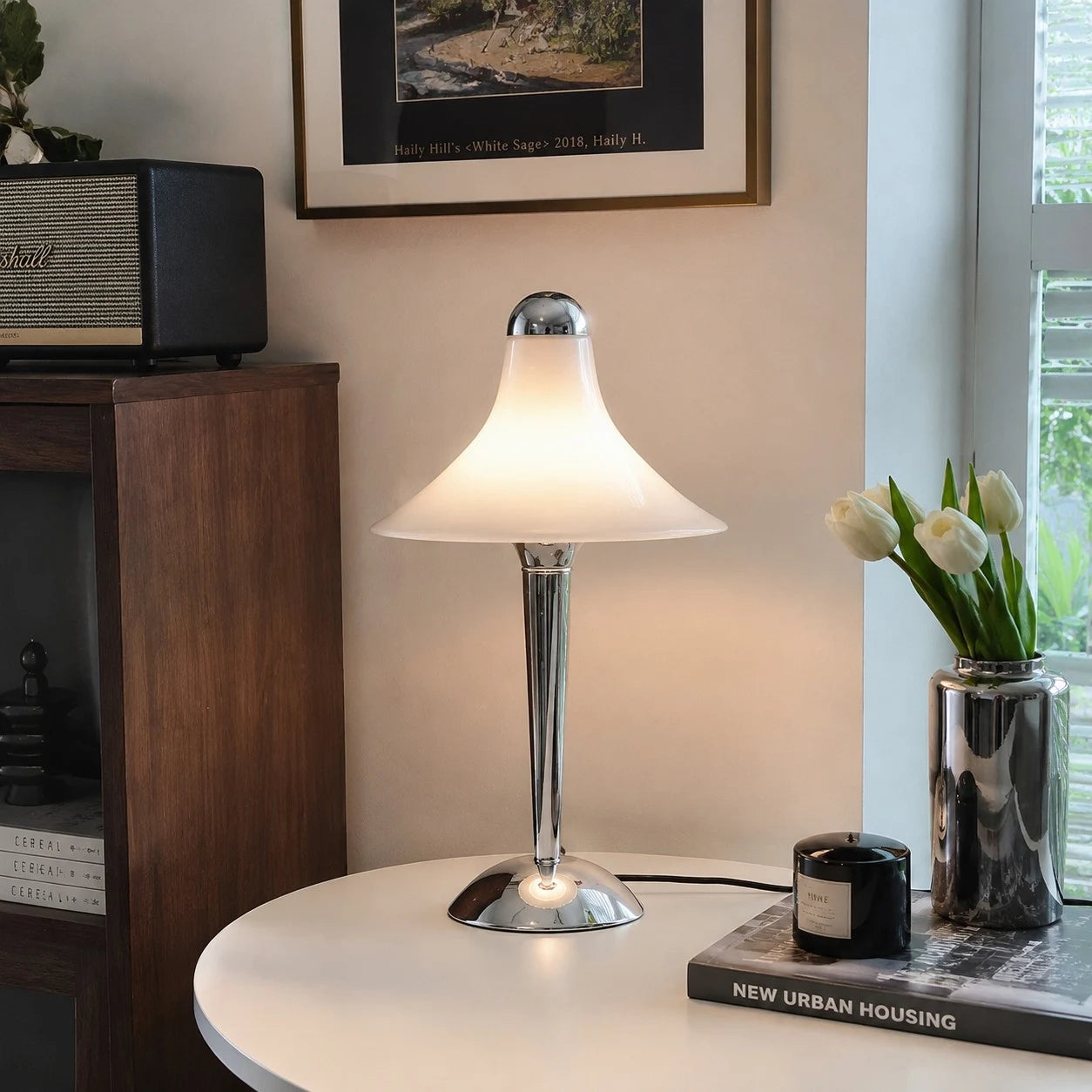 White table lamp on a round living room table