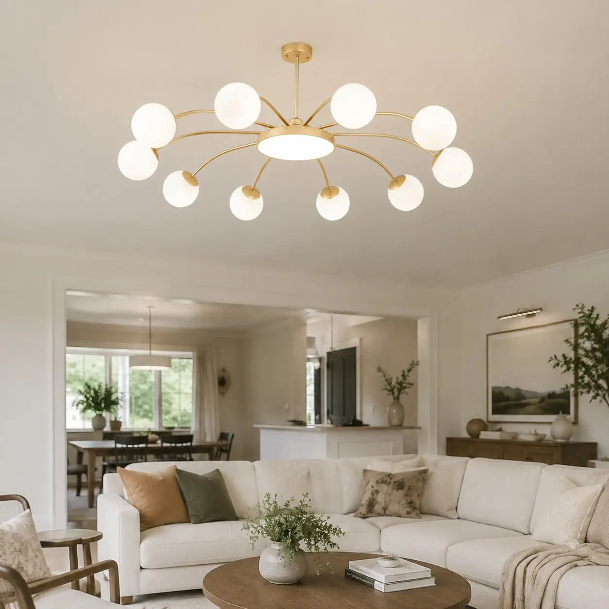 Gold ten-light chandelier in an open-plan room