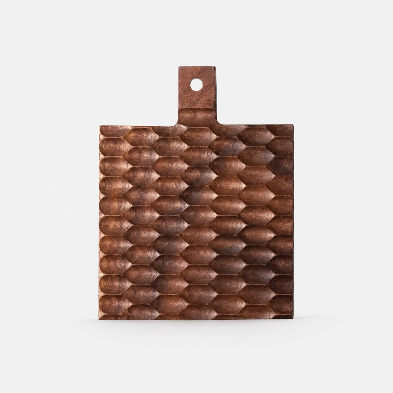 Small black walnut textured serving board on a light background