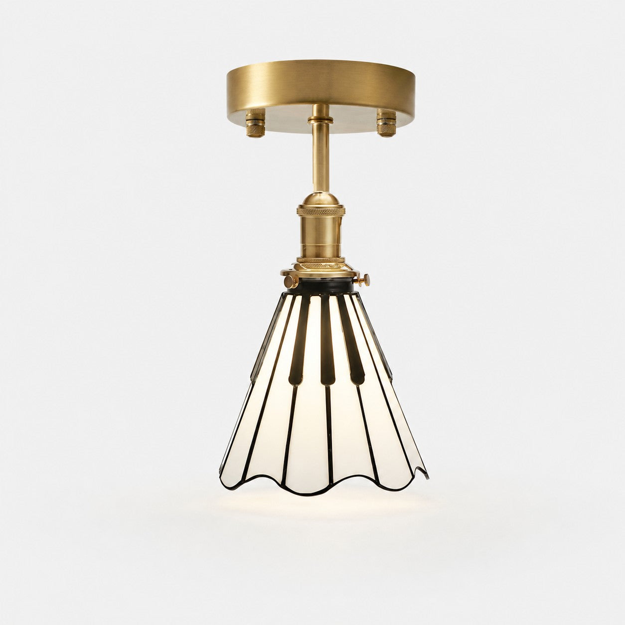Piano key flush mount ceiling light in antique brass, black and opal glass