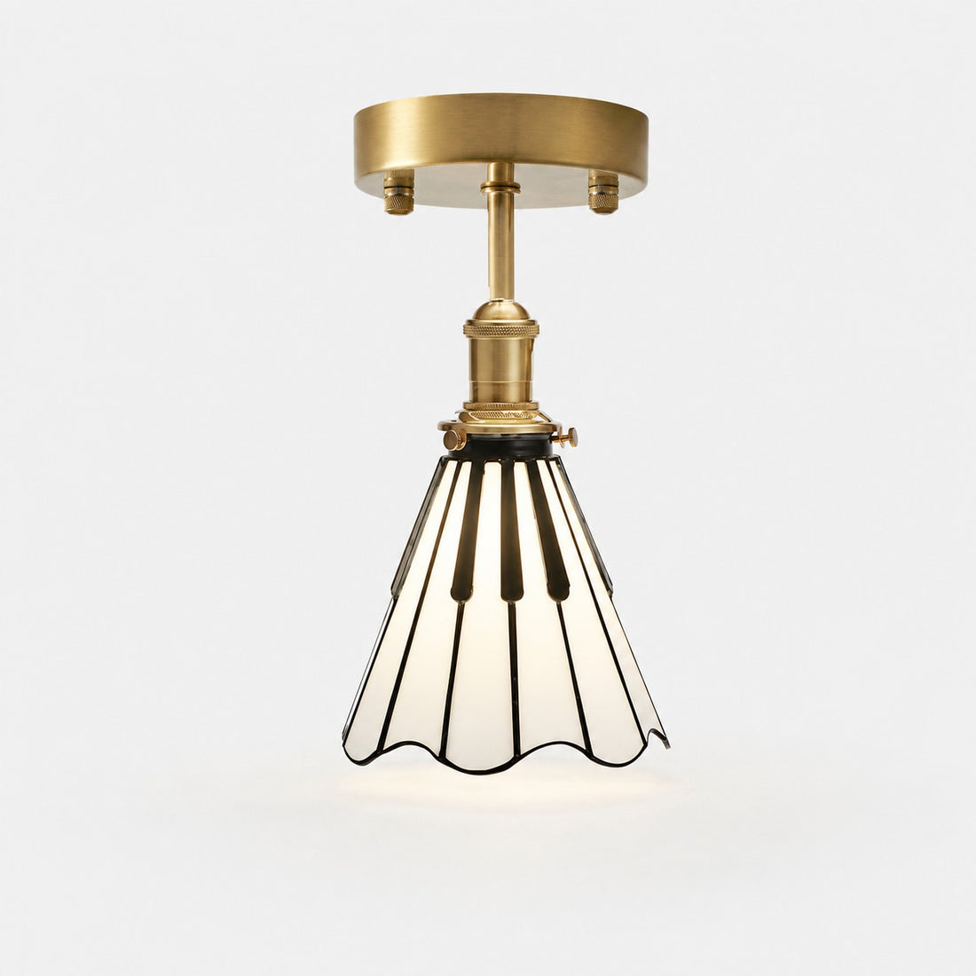 Piano key flush mount ceiling light in antique brass, black and opal glass