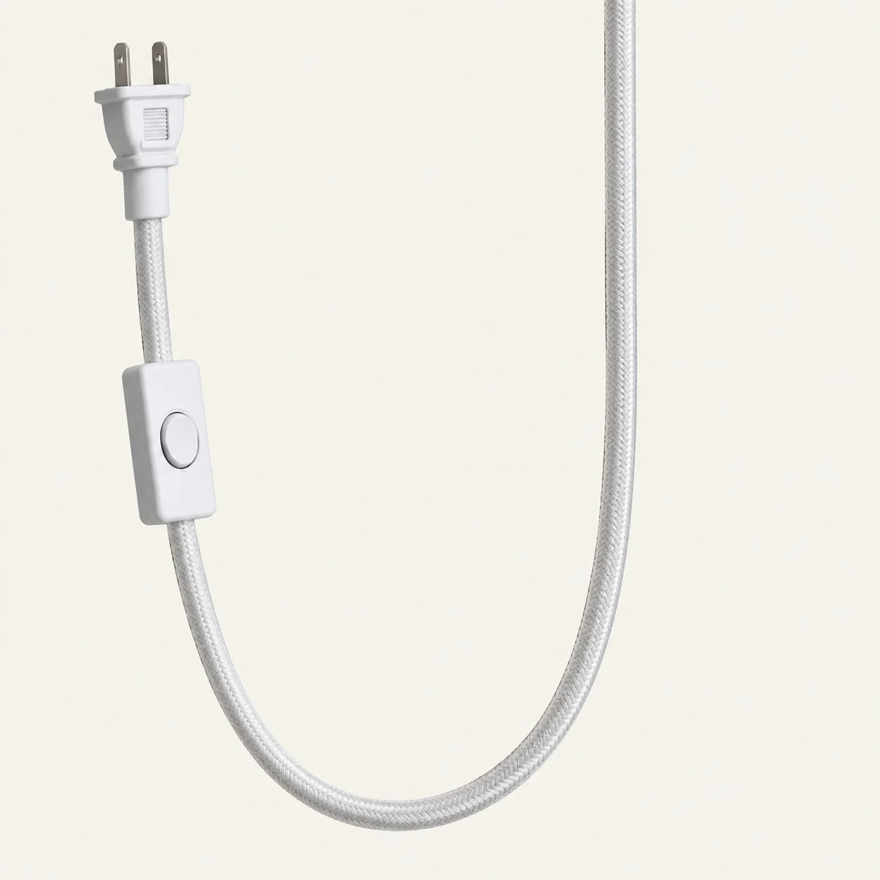 Close-up of braided plug-in cord and inline switch