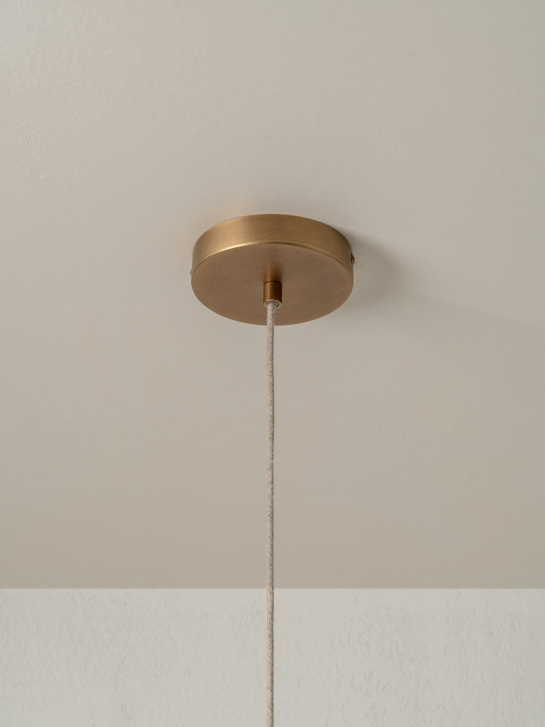 Lindi - small aged brass and linen scalloped pendant