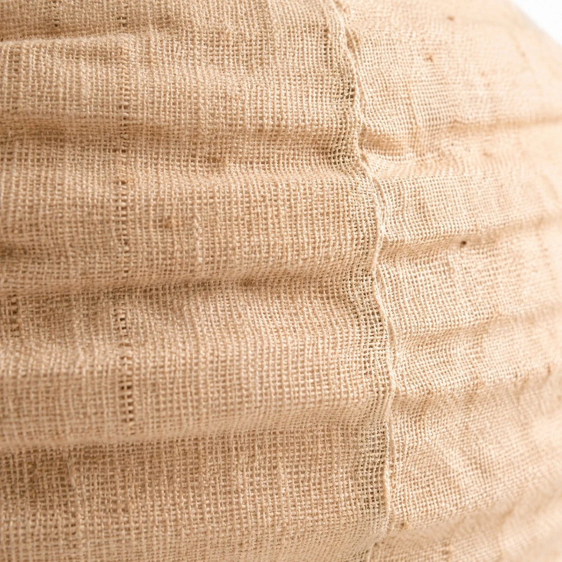Close view of cotton-linen shade weave and stitched seam