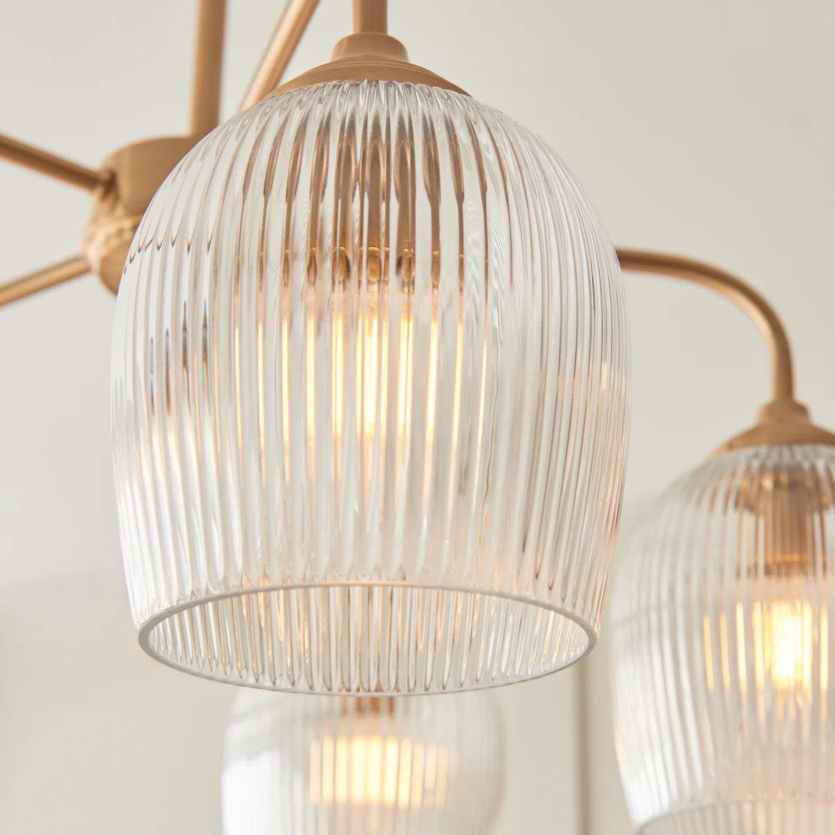 Brazara Multi-Light Glass Shade Pendant Lamp – Curved Metal Arms for Modern Homes