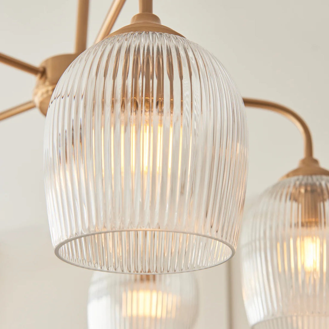 Brazara Multi-Light Glass Shade Pendant Lamp – Curved Metal Arms for Modern Homes