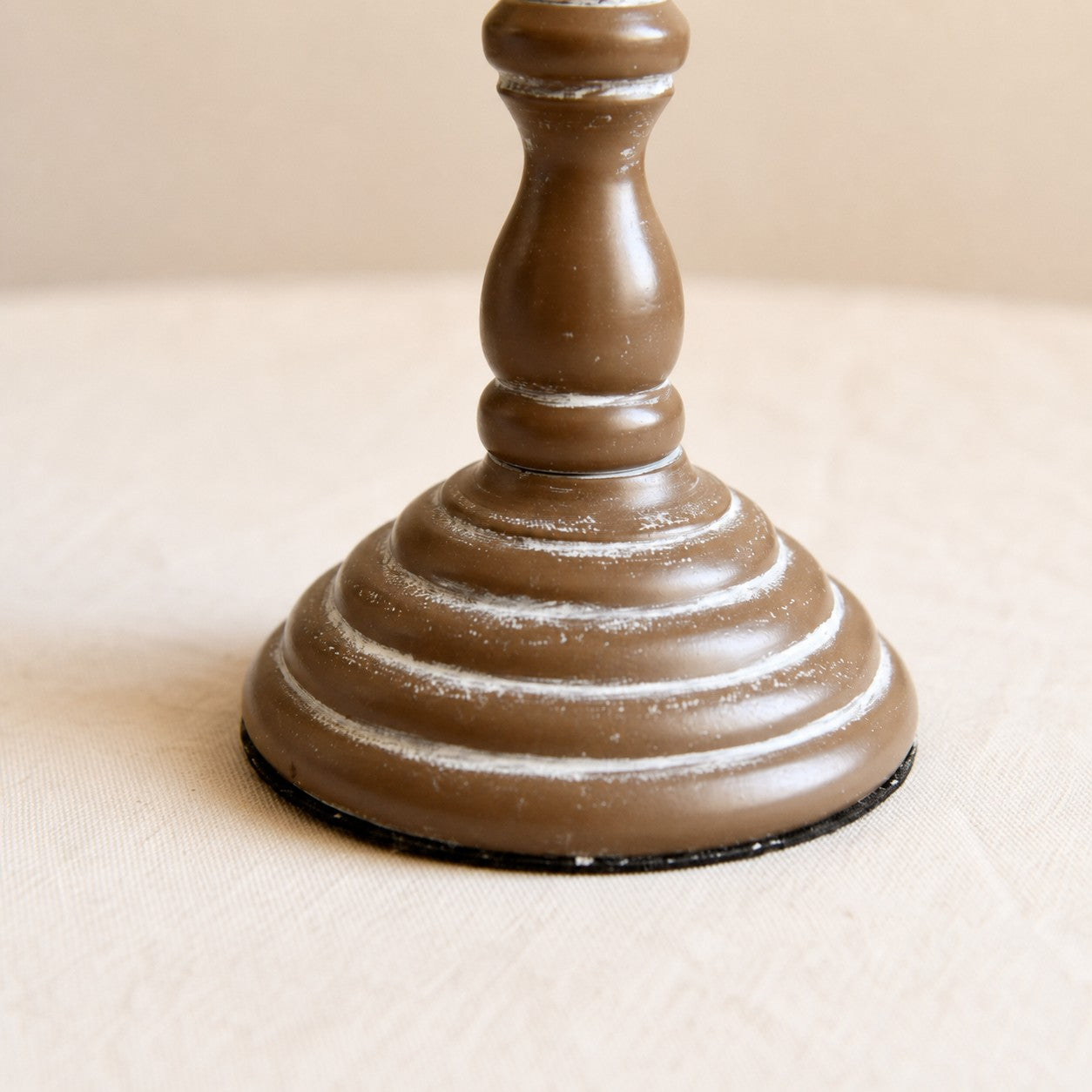 Distressed brown metal base close detail on vintage table lamp
