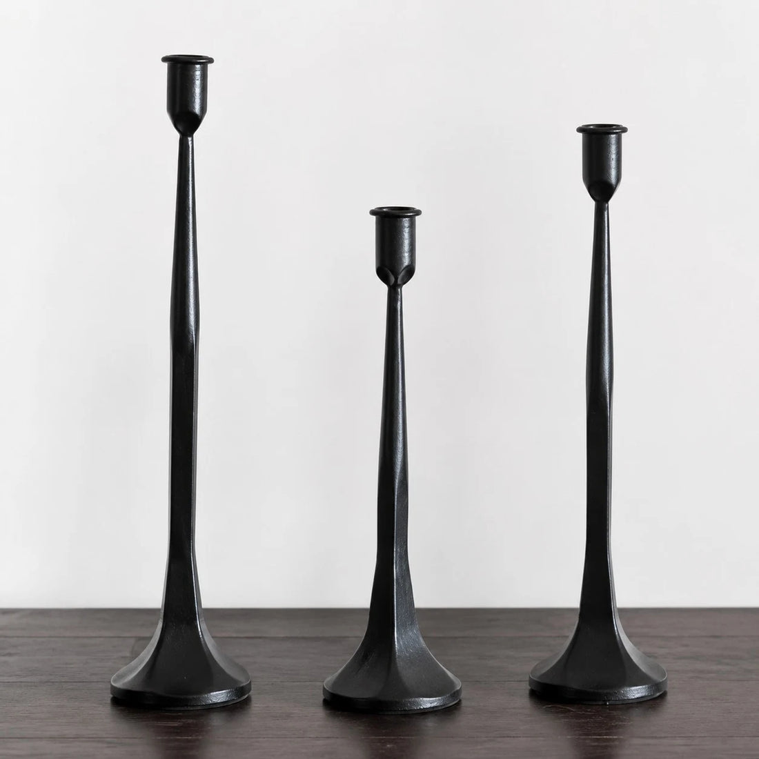 Three piece black iron candle holder set without candles