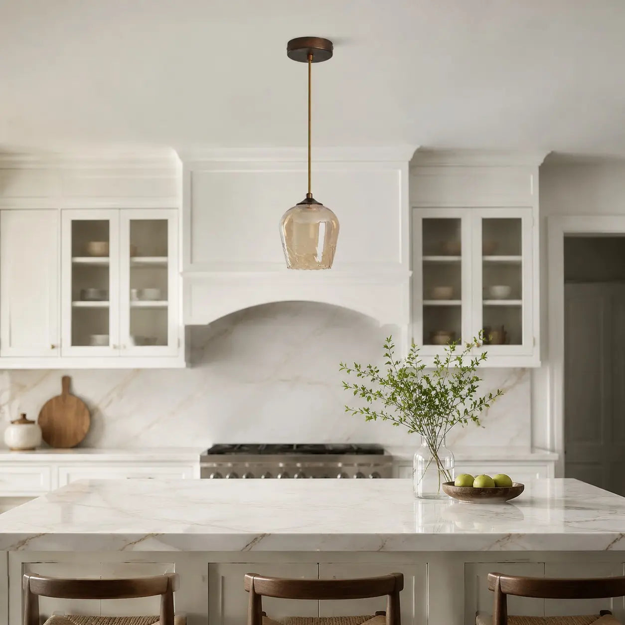Amber glass pendant light in a bright kitchen