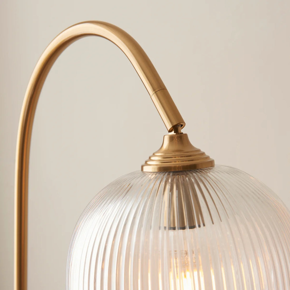 Brazara Adjustable Glass Shade Floor Lamp – Curved Metal Stem for Living Spaces