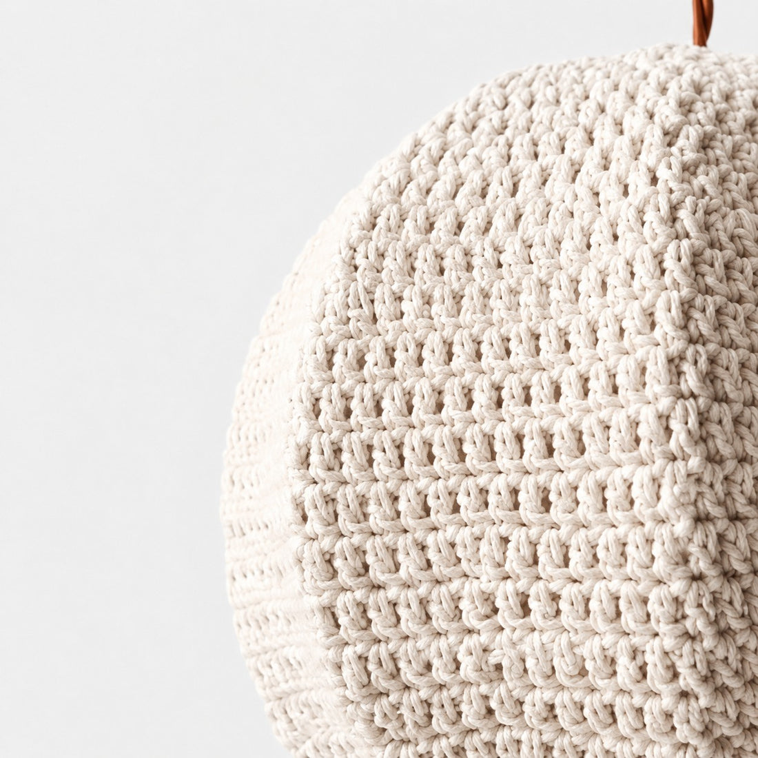 Macro close-up of layered ivory woven stitch texture