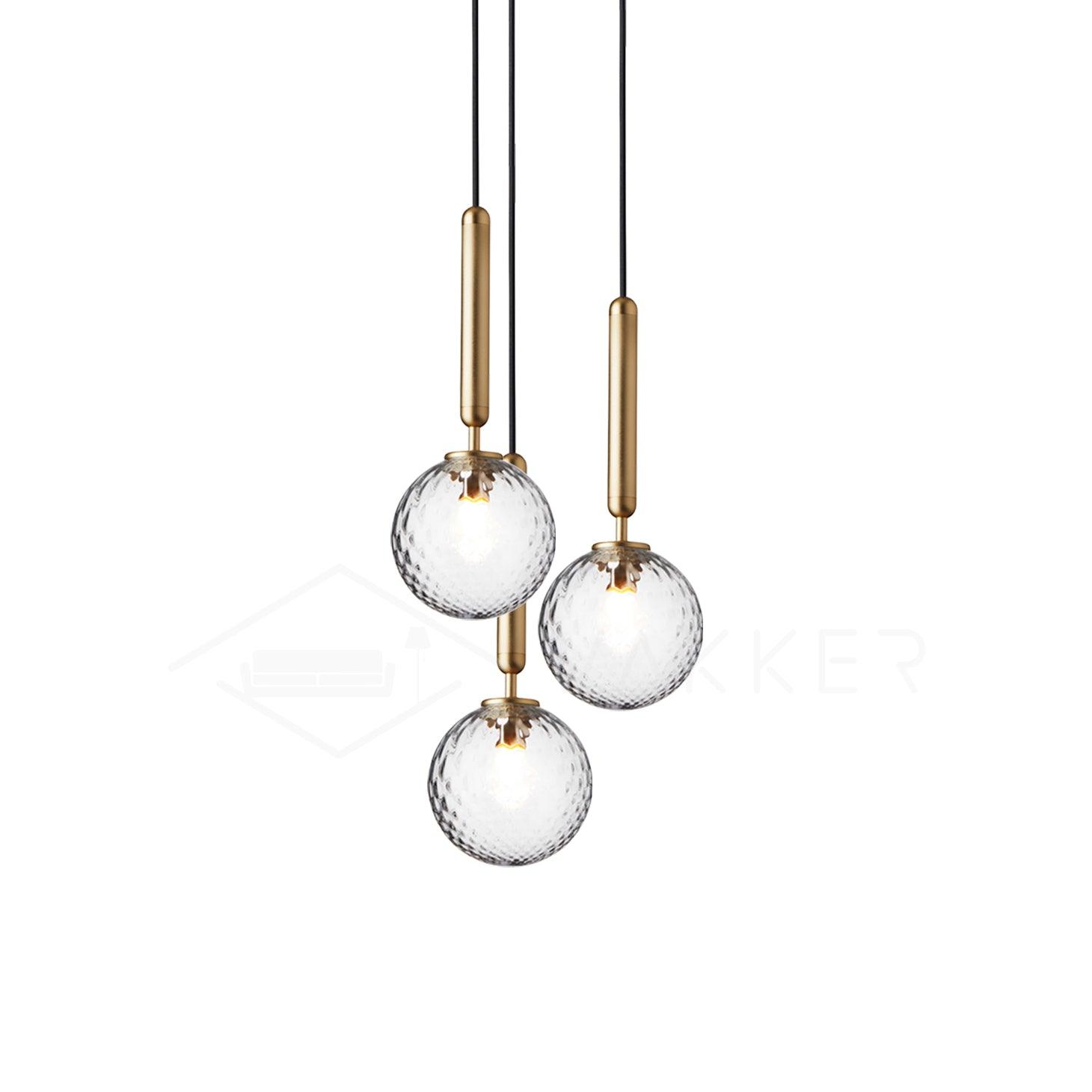 Abgerundete Stecker-Pendelleuchte aus Messing und Glas