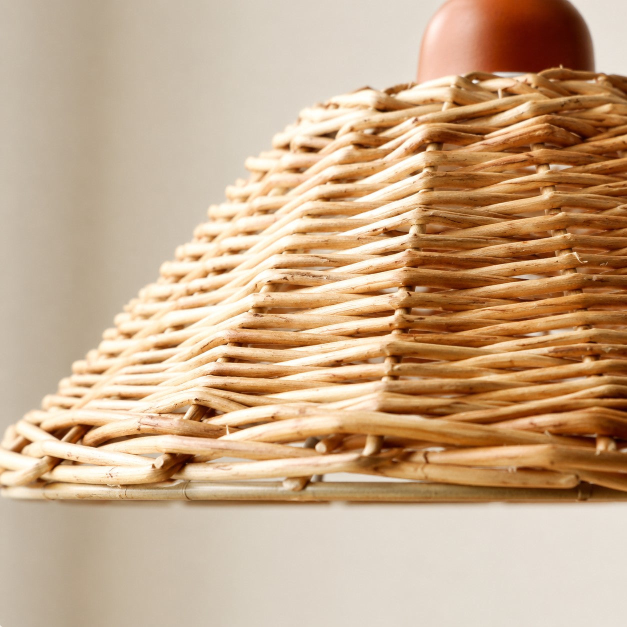 Natural rattan pendant shade edge and weave detail