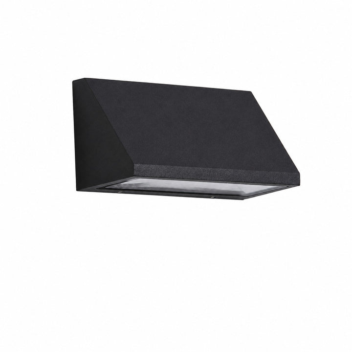 Black outdoor wall light installed on a courtyard wall