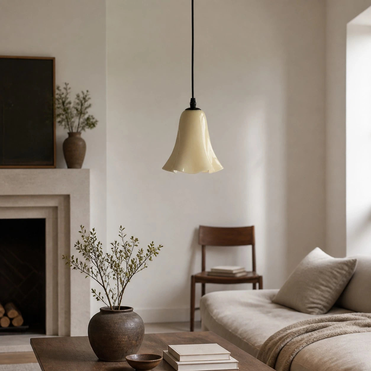 Cream yellow glass pendant light in a living room
