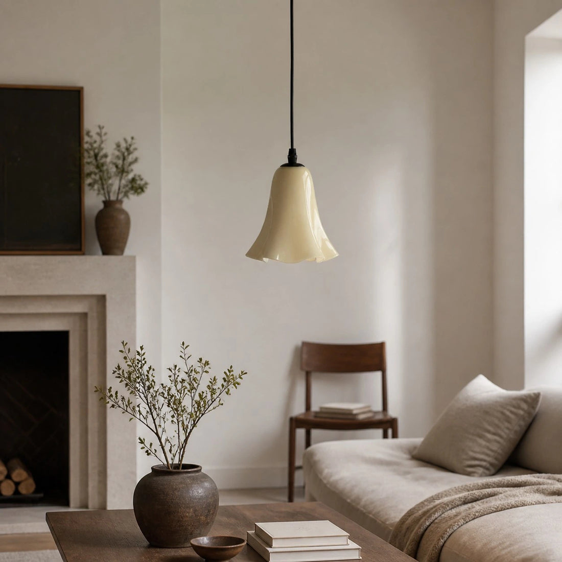Cream yellow glass pendant light in a living room