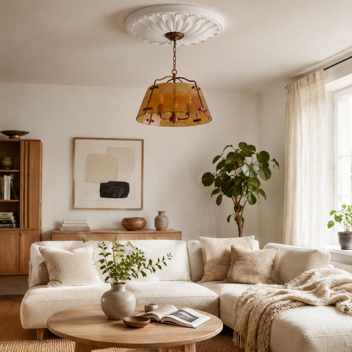 Amber glass pendant chandelier in a bright living room