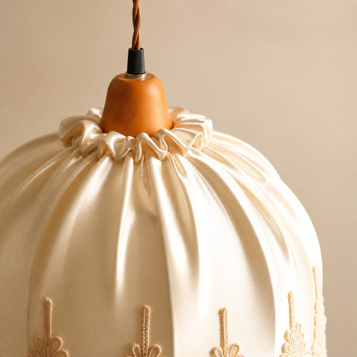 Pleated fabric shade top detail