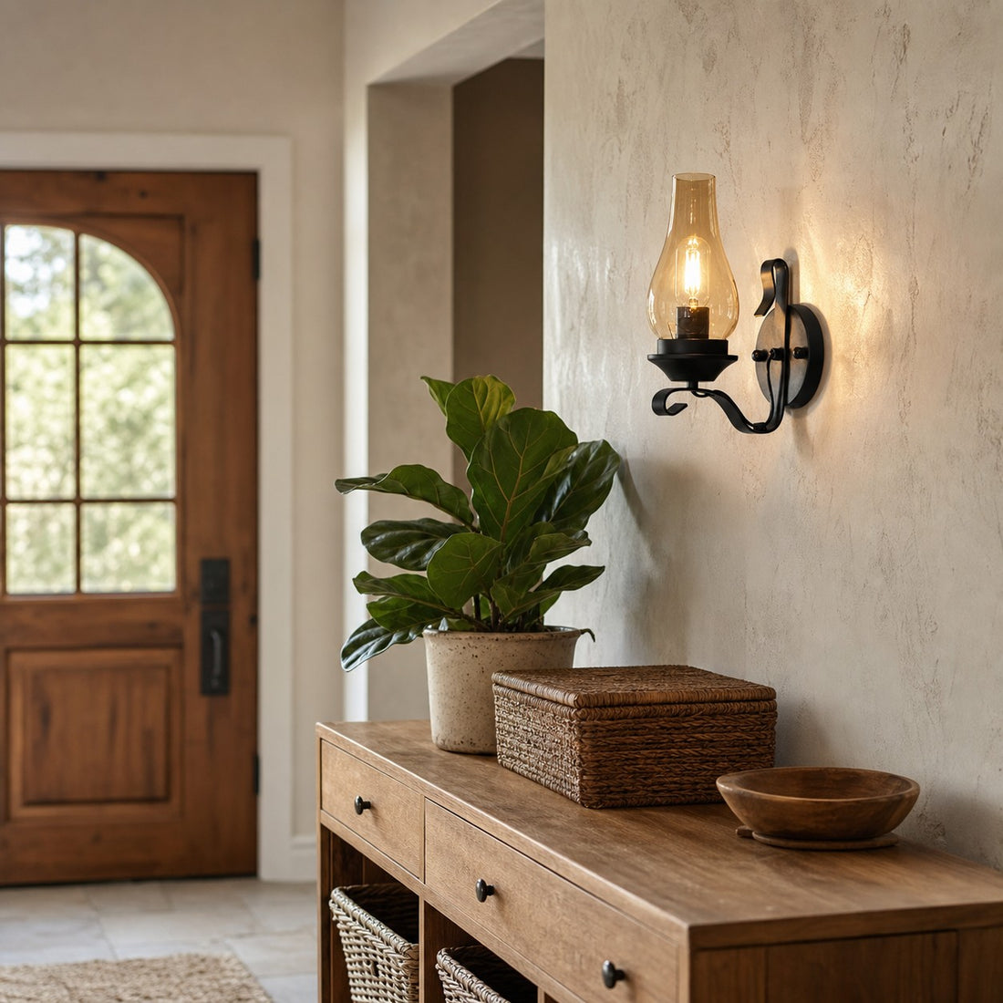 Industrial wall lamp glowing beside an entry console