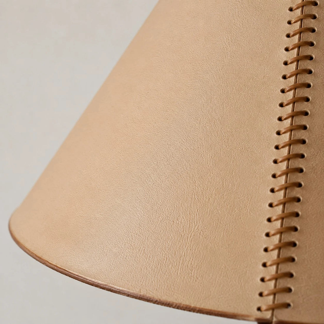 Close detail of stitched leather shade seam