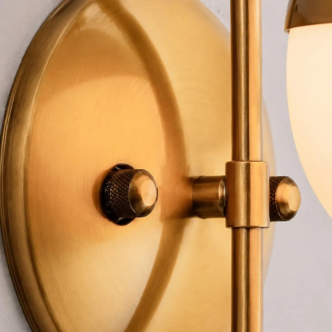 Wall plate and arm joint detail