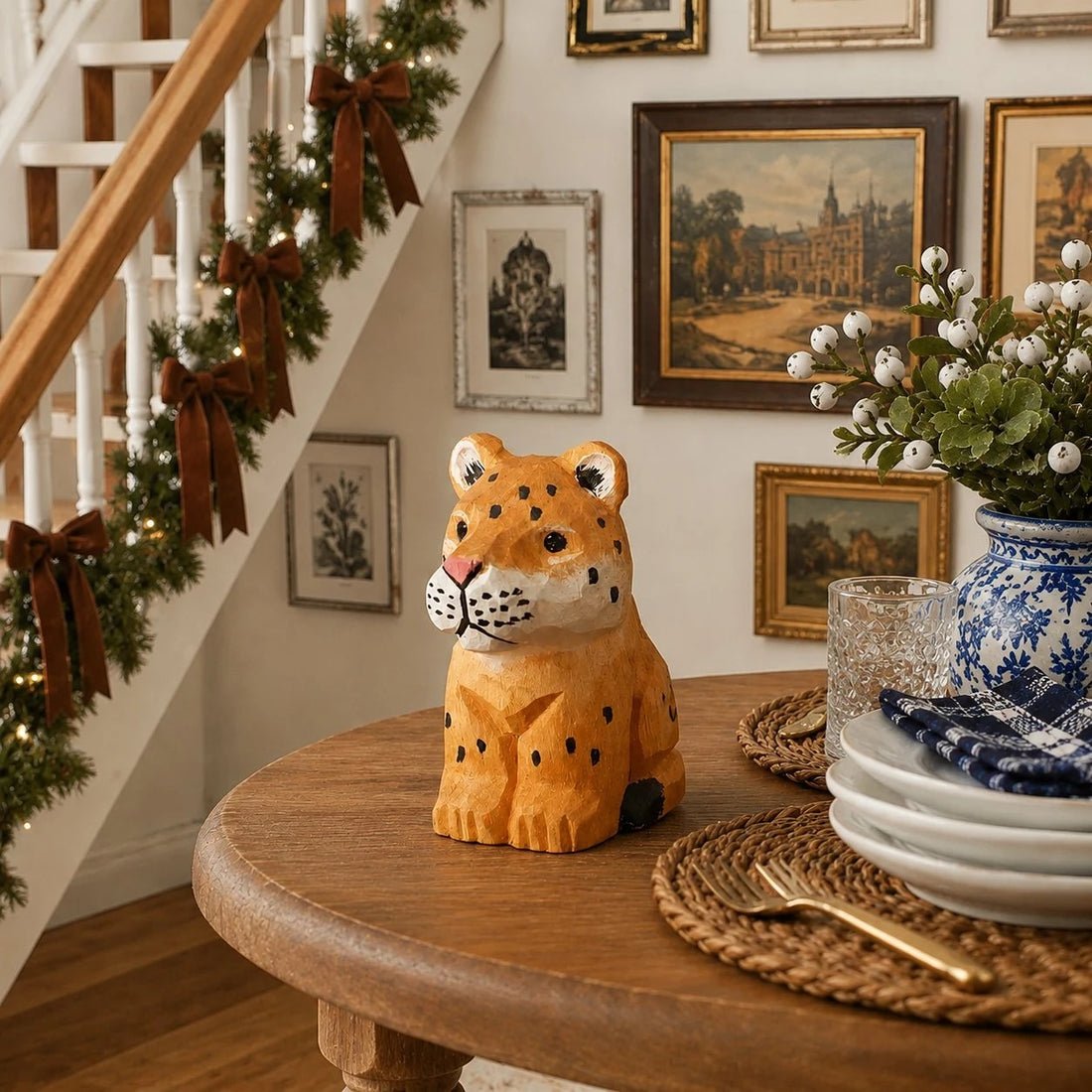 Wooden leopard figurine styled on a table