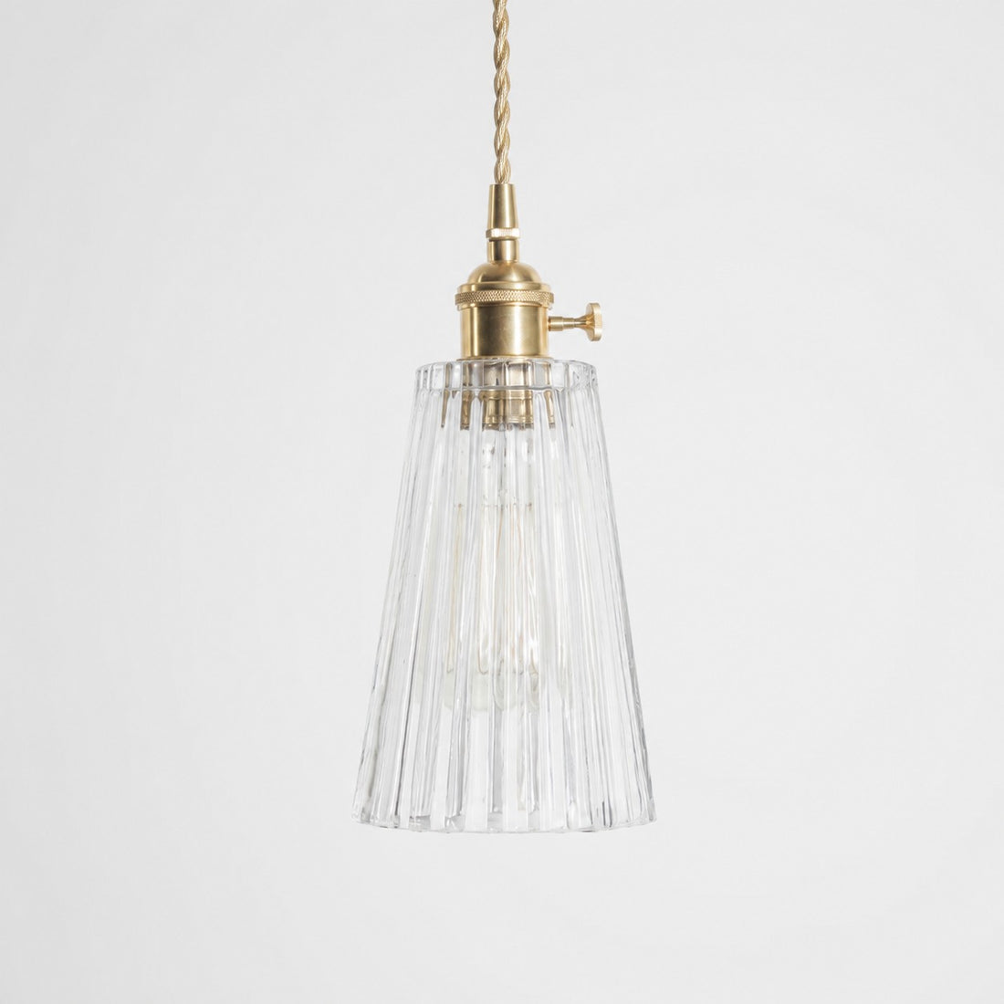 Style G textured glass shade with antique brass E27 socket, front view