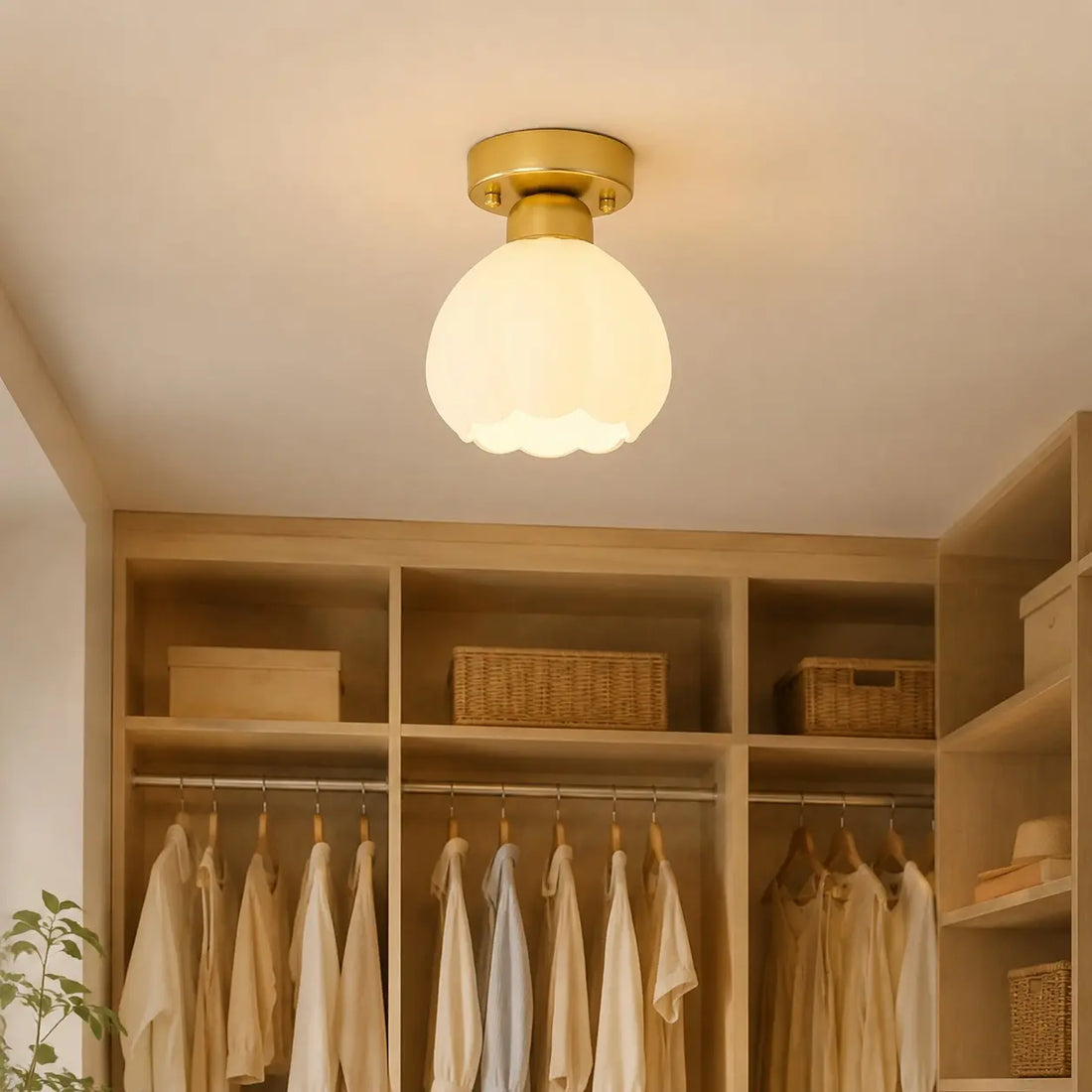 Milk glass flower ceiling light in a small dressing room
