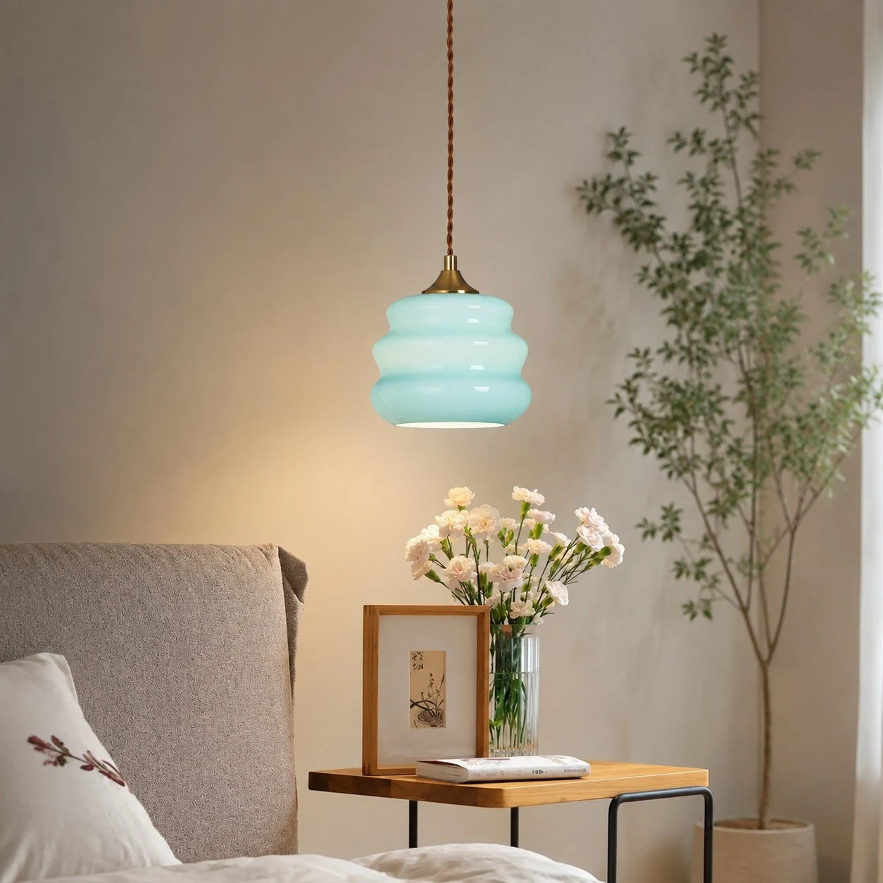 Pendant light glowing in a bedroom corner