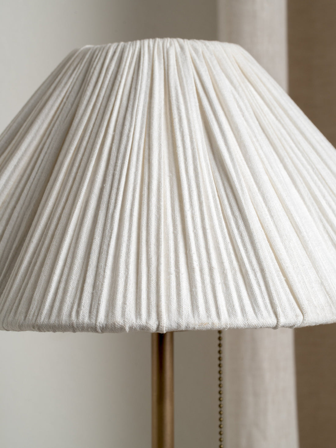 Lindi - aged brass and scalloped linen table lamp