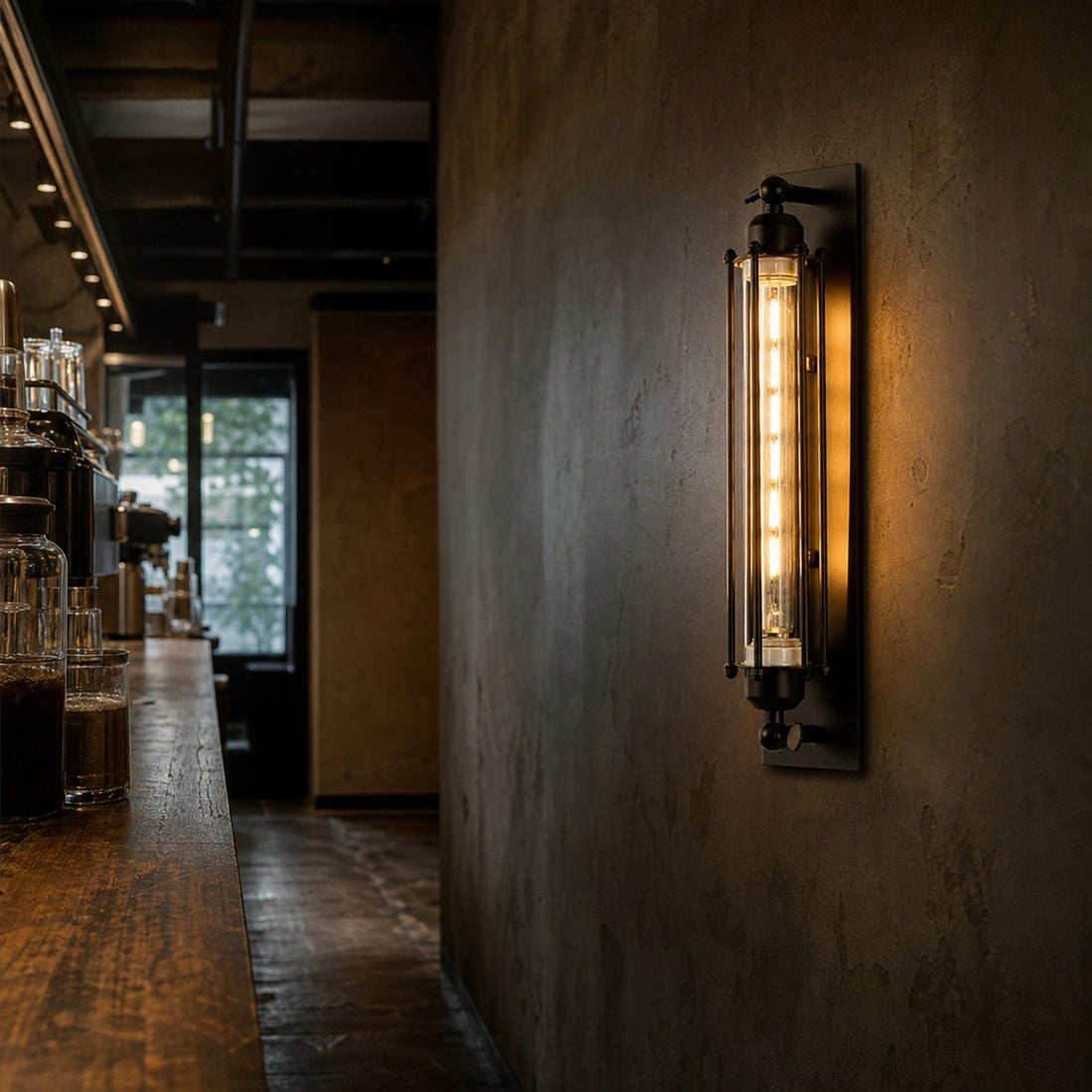 Industrial tube wall sconce installed on a corridor wall
