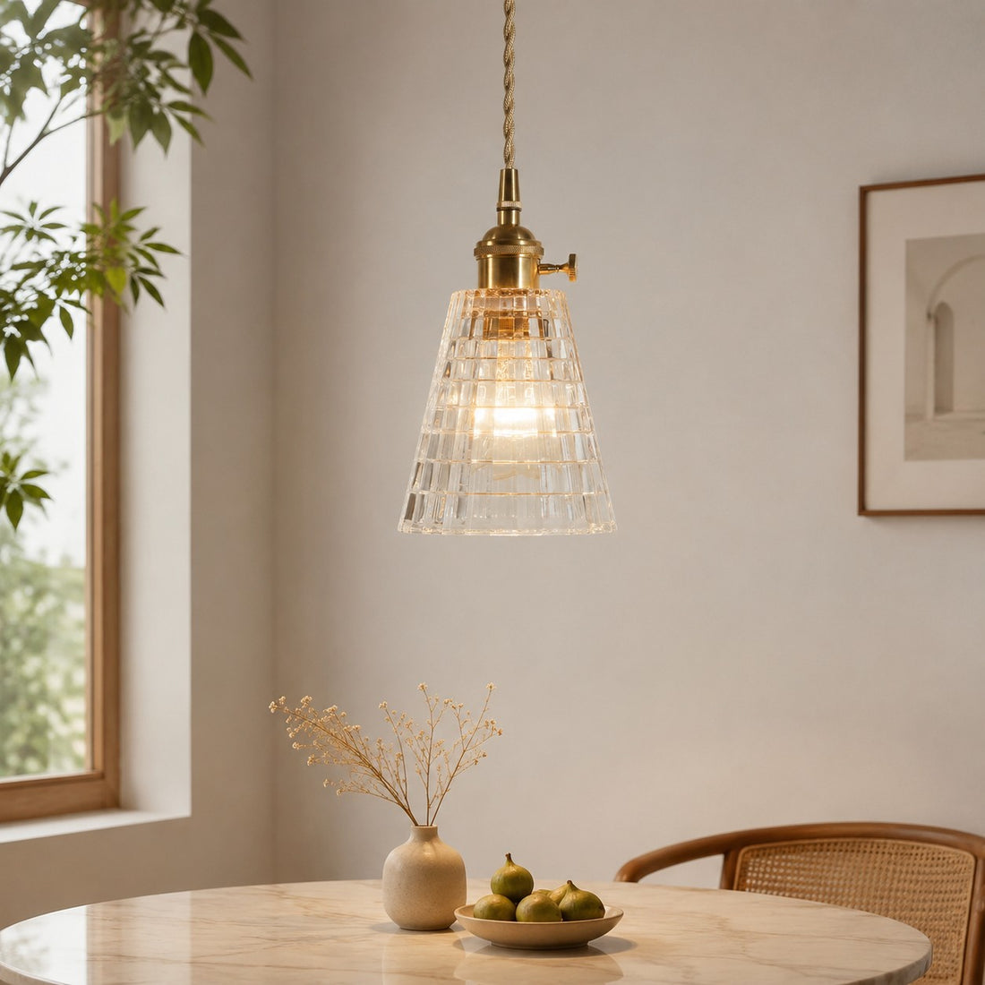 Style E geometric glass pendant above a wooden dining table