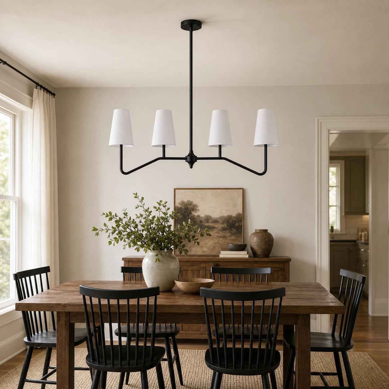 Strellux black linear chandelier in a dining room setting