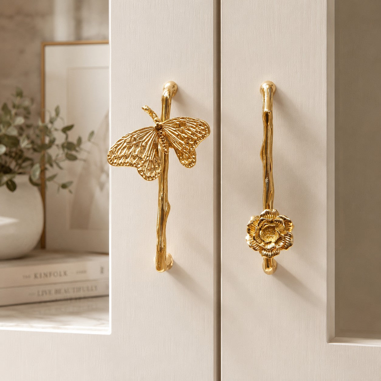 Polished brass drawer handle shown at cabinet scale