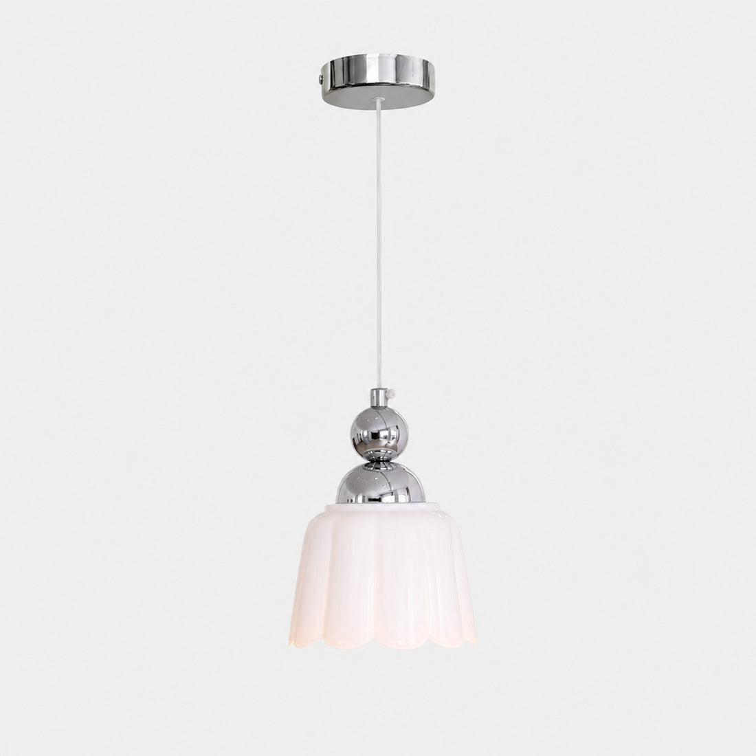 White scalloped ceramic pendant lamp with polished metal canopy